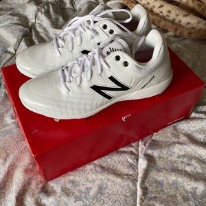 New Balance baseball cleats.